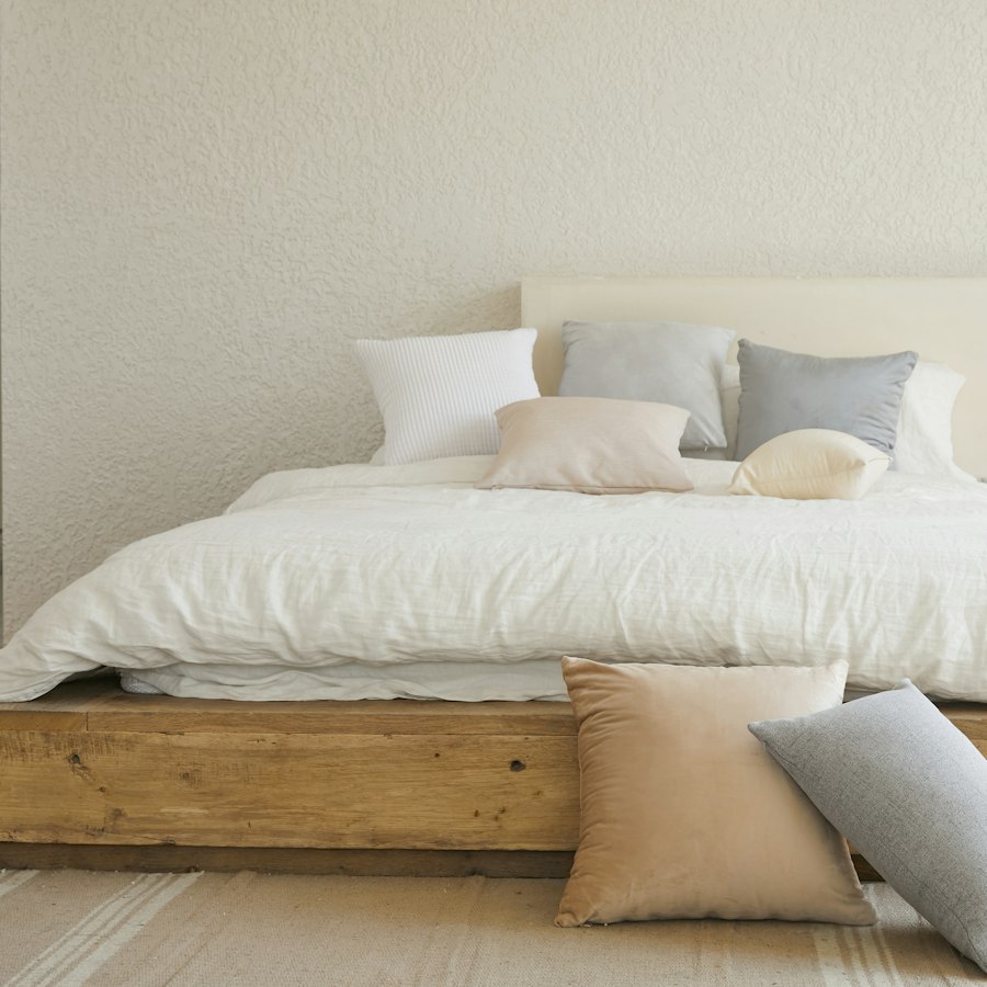 Clean bedroom with a freshly made bed